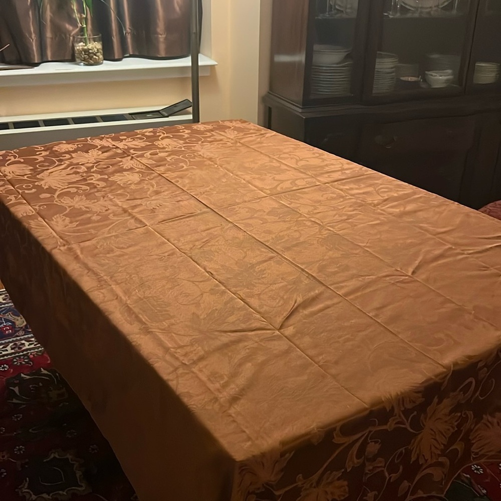 Stunning tablecloth with embossed leaf design.
59” x 82